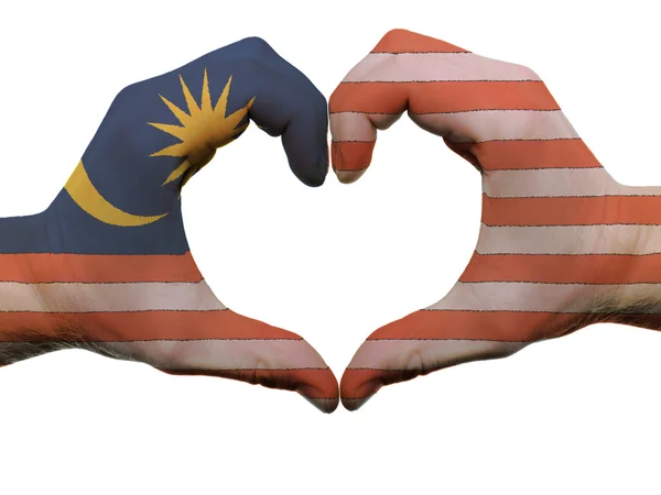 stock image Heart and love gesture in malaysia flag colors by hands isolated