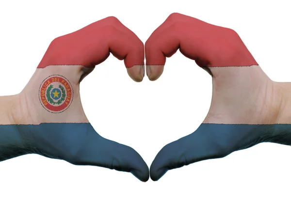 Szíve és a szeretet gesztusa paraguay lobogó színek kezében elszigetelt — Stock Fotó