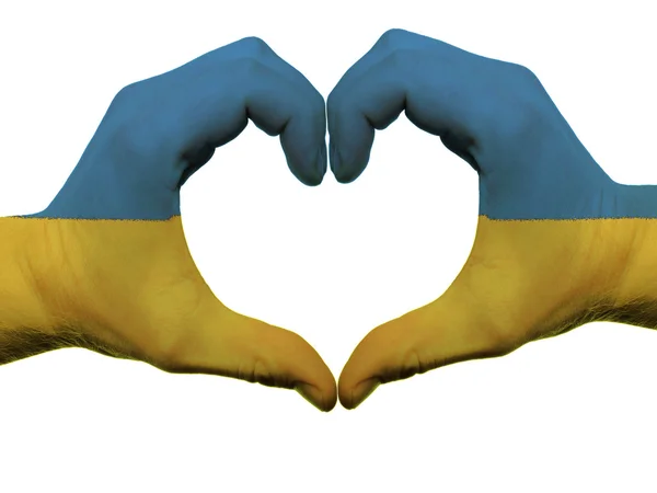 Καρδιά και αγάπη χειρονομία στα χρώματα της Ουκρανίας σημαία από χέρια που έχουν απομονωθεί — Φωτογραφία Αρχείου