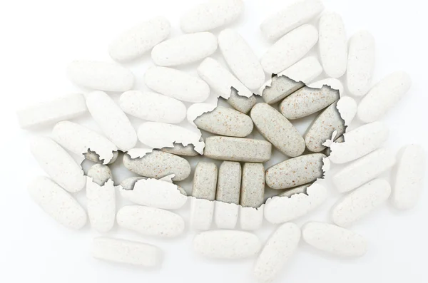 Outline map of austria with transparent pills in the background — Stock Photo, Image