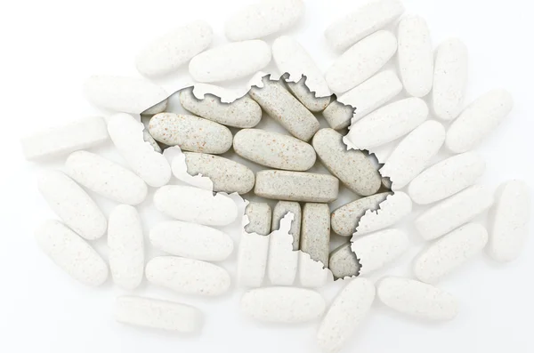 Outline map of belgium with transparent pills in the background — Stock Photo, Image