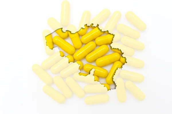 Mapa do contorno da Bélgica com pílulas transparentes em segundo plano — Fotografia de Stock