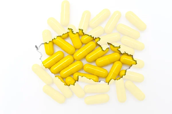 Outline mappa di ceco con pillole trasparenti sullo sfondo fo — Foto Stock