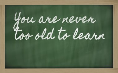 Expression - You are never too old to learn - written on a scho clipart