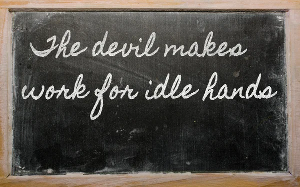 Expresión - El diablo hace el trabajo para las manos ociosas - escrito en un — Foto de Stock