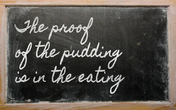 Expression - The proof of the pudding is in the eating - writte — Stock Photo, Image