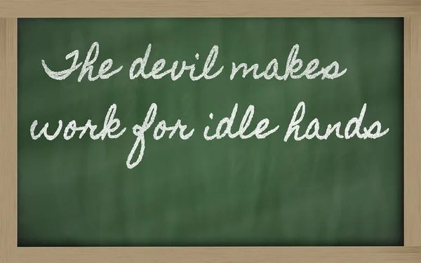 Expression - The devil makes work for idle hands - written on a — Stock Photo, Image