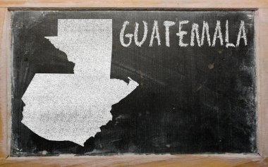 Outline map of guatemala on blackboard clipart