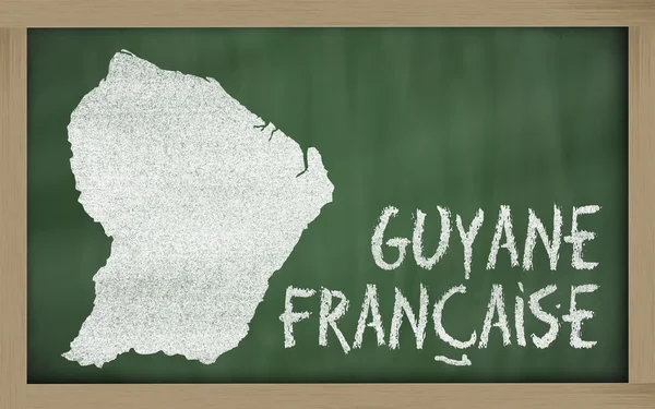 stock image Outline map of french guiana on blackboard