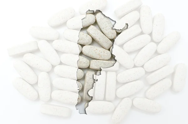 Outline map of argentina with pills in the background for health — Stock Photo, Image