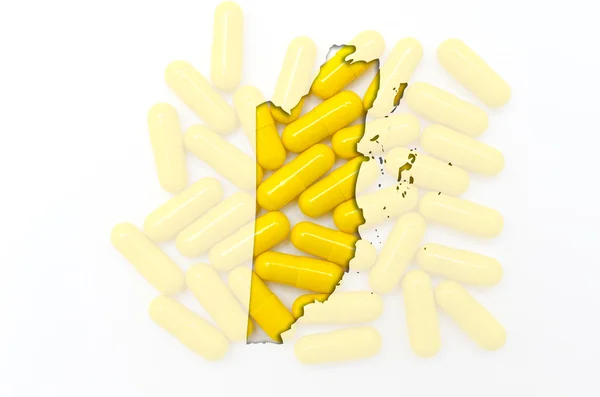 Umrisskarte von Belize mit Pillen im Hintergrund für Gesundheit und — Stockfoto