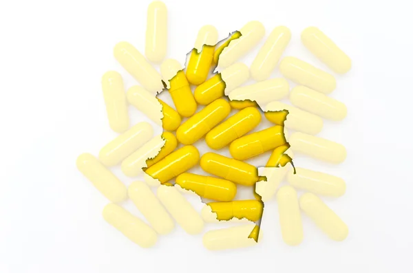 Контурна карта Колумбії з таблетками на задньому плані для здоров'я — стокове фото
