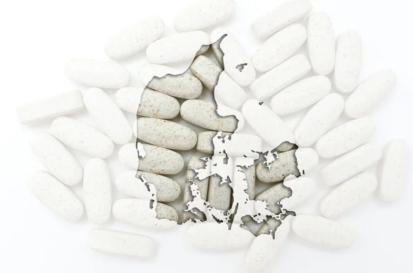 Mapa do contorno de denmark com pílulas em segundo plano para a saúde a — Fotografia de Stock
