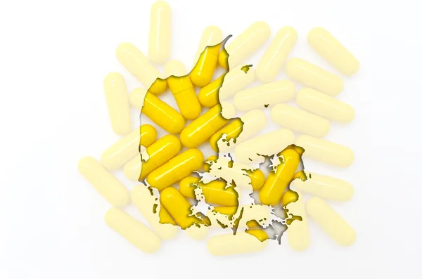 Umrisskarte von Dänemark mit Pillen im Hintergrund für Gesundheit a — Stockfoto