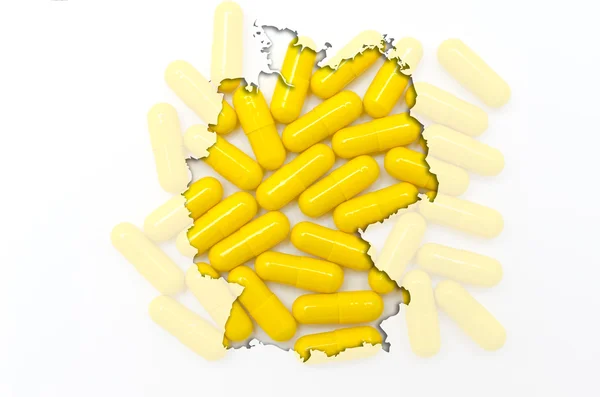 Περίγραμμα της Γερμανίας με χάπια στο παρασκήνιο για την υγεία ένα — Φωτογραφία Αρχείου