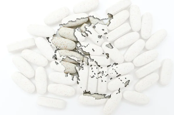 Outline map of greece with pills in the background for health an — Stock Photo, Image