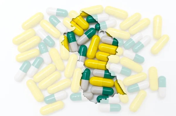 Tablettákat, a háttérben a egészségügyi szerkezeti guyana Térkép egy — Stock Fotó