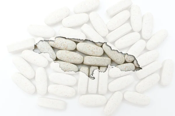 Outline map of jamaica with pills in the background for health a — Stock Photo, Image