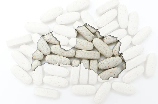 Mapa esboço de latvia com pílulas em segundo plano para a saúde e — Fotografia de Stock