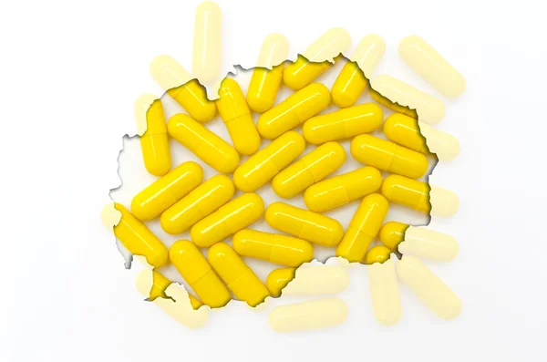 Umrisskarte von Mazedonien mit Pillen im Hintergrund für die Gesundheit — Stockfoto
