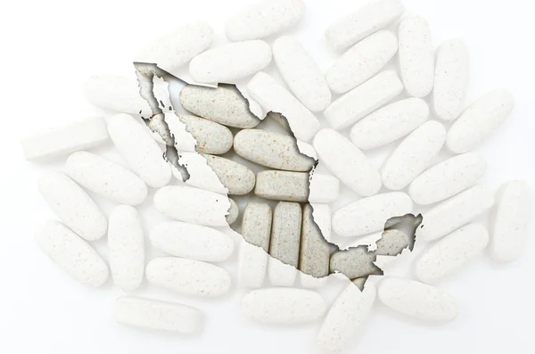 Umrisskarte von Mexiko mit Pillen im Hintergrund für Gesundheit und — Stockfoto