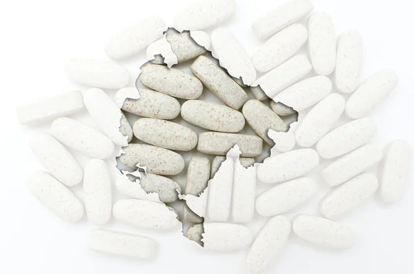 Outline map of netherlands with montenegro pills in the backgrou — Stock Photo, Image
