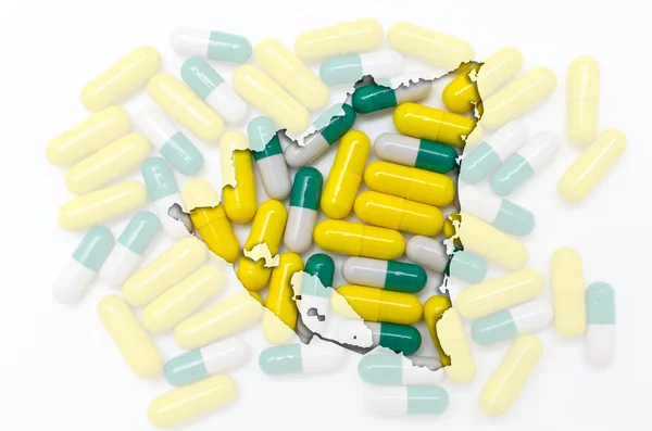 Übersichtskarte von Nicaragua mit Pillen im Hintergrund für die Gesundheit — Stockfoto