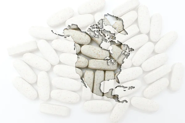 Overzicht-kaart van Noord-Amerika met pillen op de achtergrond voor hij — Stockfoto