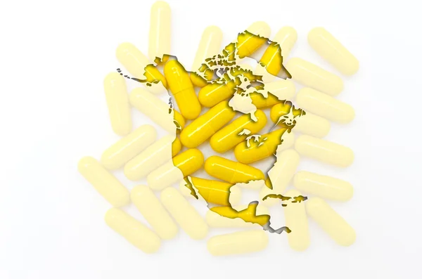 Outline map of north america with pills in the background for he — Stock Photo, Image