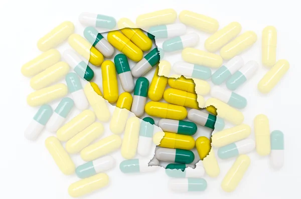 Konturkarta över paraguay med piller i bakgrunden för hälsa — Stockfoto
