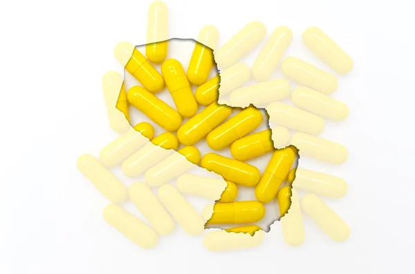 Mapa do contorno do paraguai com pílulas em segundo plano para a saúde — Fotografia de Stock