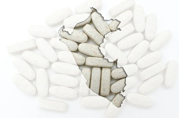 Outline map of peru with pills in the background for health and — Stock Photo, Image