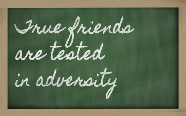 Expression - True friends are tested in adversity - written on clipart