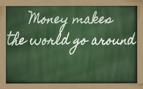 Expression - L'argent fait tourner le monde - écrite sur un sch — Photo