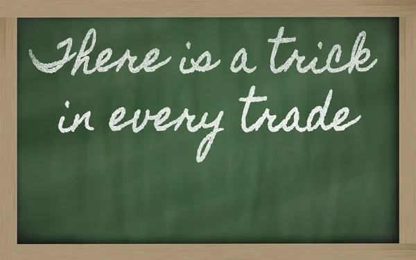 stock image Expression - There is a trick in every trade - written on a sch