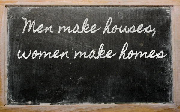 Uttryck - män göra hus, kvinnor göra bostäder - skriven på en s — Stockfoto