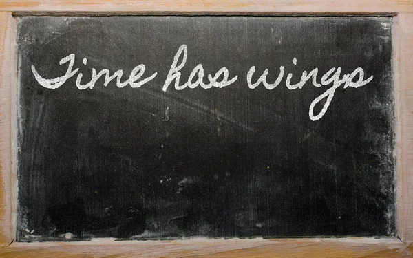 Espressione - Il tempo ha le ali - scritta su una lavagna scolastica con — Foto Stock