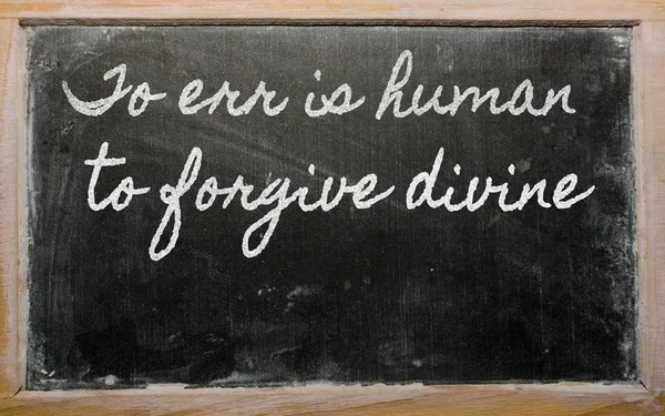 stock image Expression - To err is human, to forgive divine - written on a