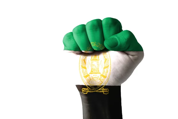Vuist geschilderd in kleuren van aghanistan vlag — Stockfoto