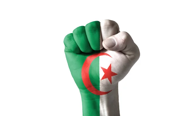 Punho pintado em cores de bandeira de algeria — Fotografia de Stock