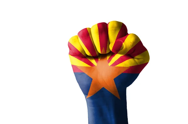 Кулак, раскрашенный в цвета нашего штата Аризона флаг — стоковое фото