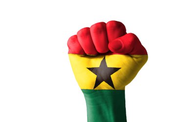 Fist painted in colors of great ghana flag clipart