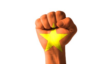 Fist painted in colors of vietnam flag clipart