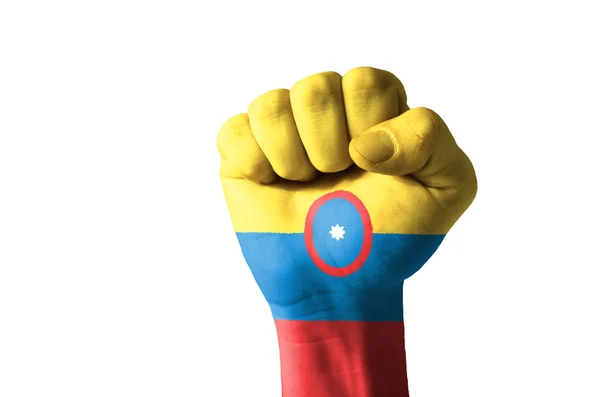 Pěst v barvách vlajky columbia — Stock fotografie
