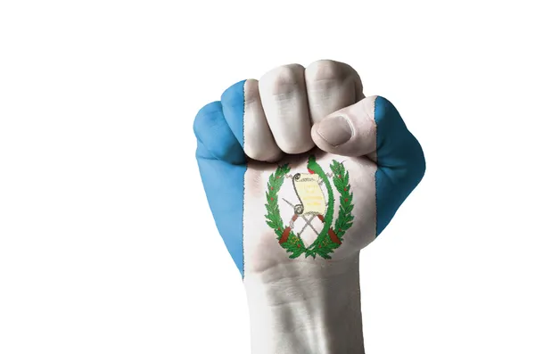Кулак, окрашенный в цвета флага Гватемалы — стоковое фото
