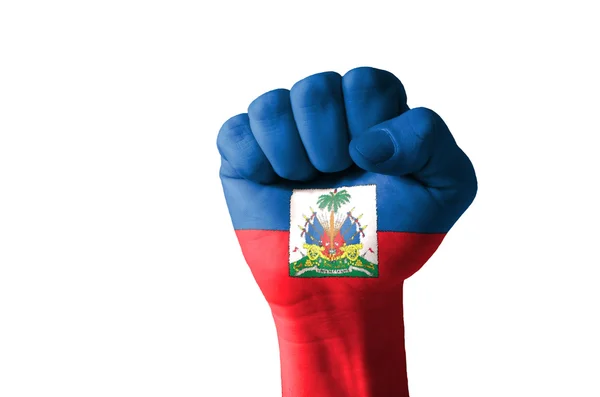 Fist painted in colors of haiti flag — Stock Photo, Image