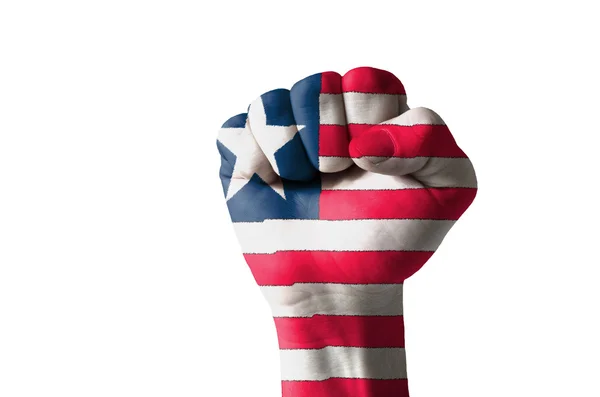 Fist painted in colors of liberia flag — Zdjęcie stockowe