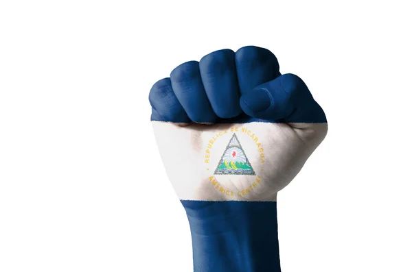 Näve målade i färgerna på Nicaraguas flagga — Stockfoto