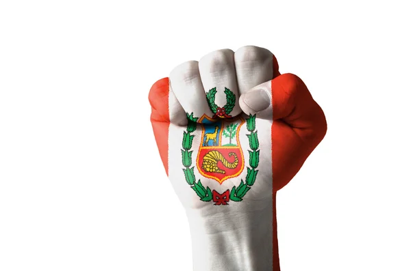 Vuist geschilderd in kleuren van de vlag van peru — Stockfoto