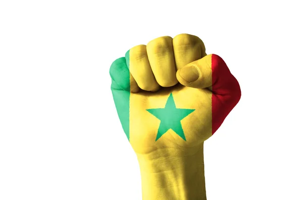 Näve målad i färger av Senegals flagga — Stockfoto
